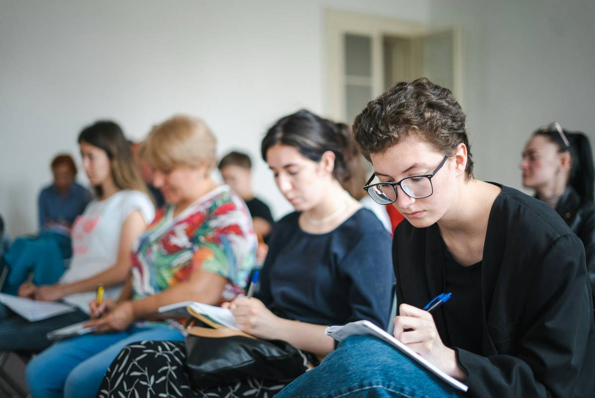 Classroom discussion showing diverse speakers illustrating sociolinguistics language variation and change